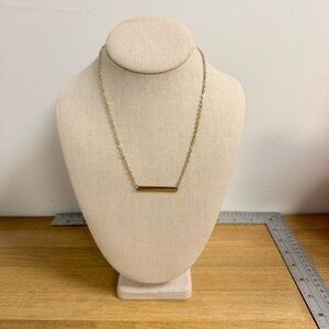 Gold tone tag bar necklace for layering